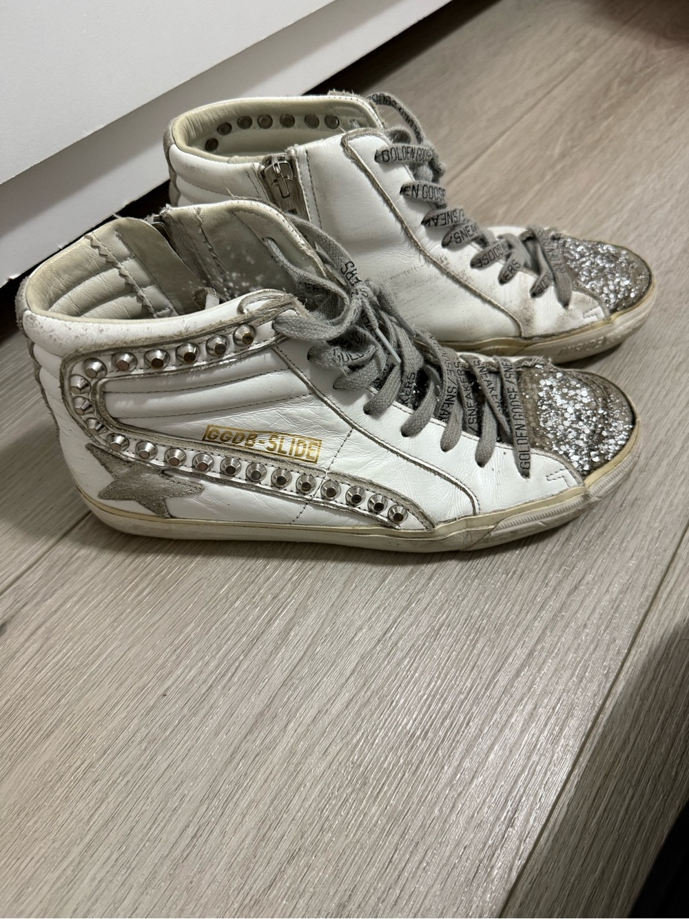 Golden Goose White High-Top Sneakers with Silver Glitter Toe and Stud Accents